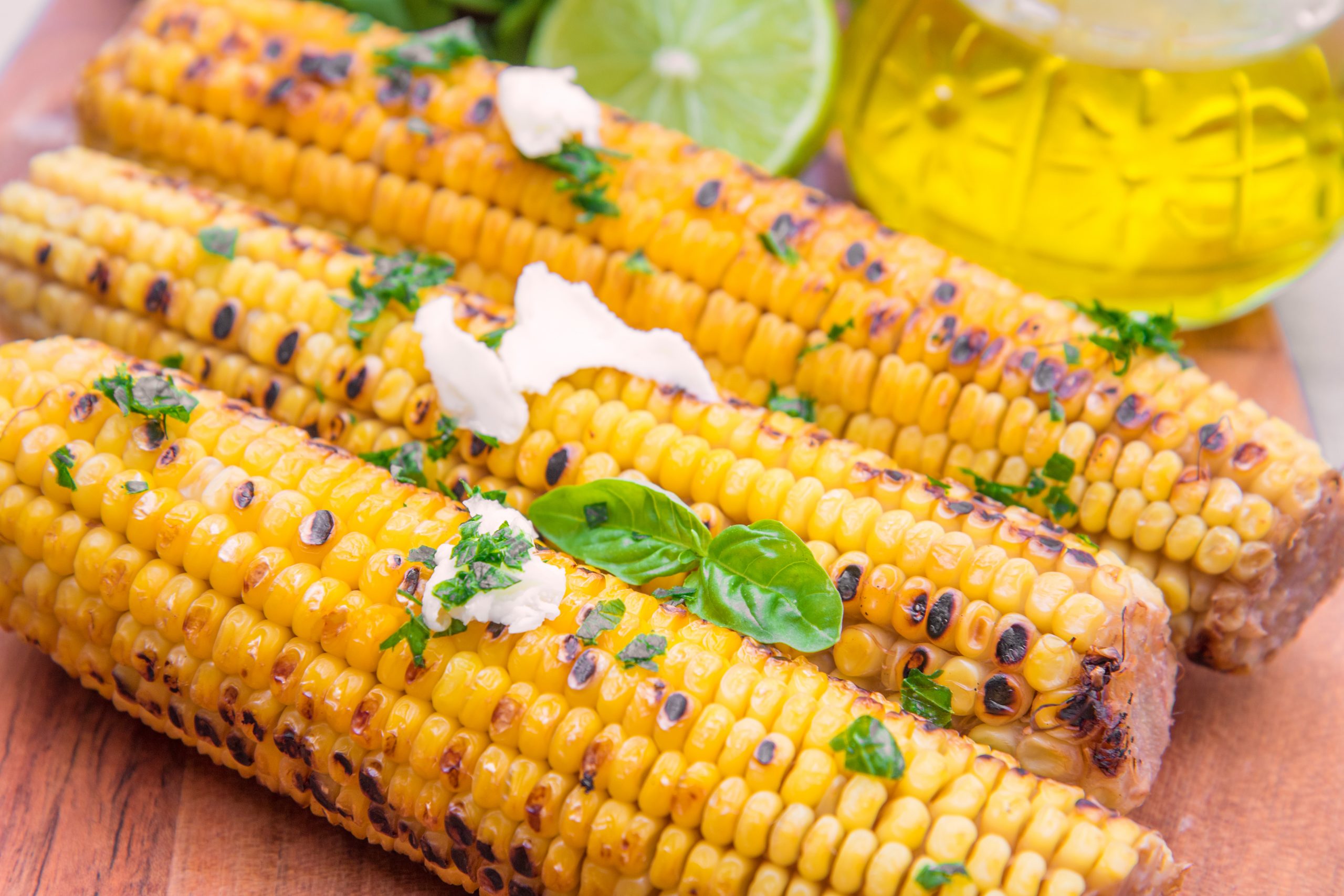 Grilled Corn with Coconut Lime Butter and Pepper Jack Cheese