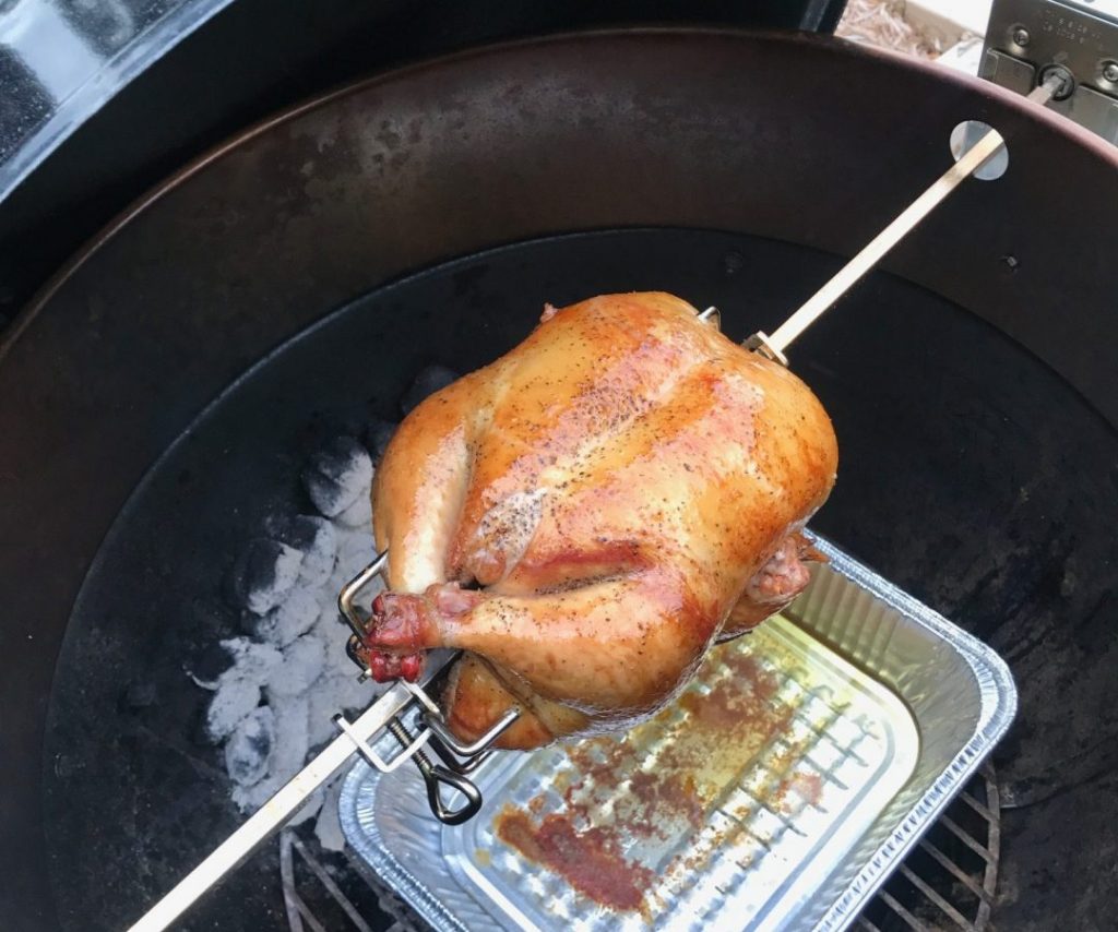 grillgirl, rotisserie chicken cooking on a spit