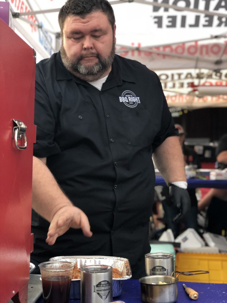 Malcom Reed cooks in an SCA event in Fort Worth, Texas