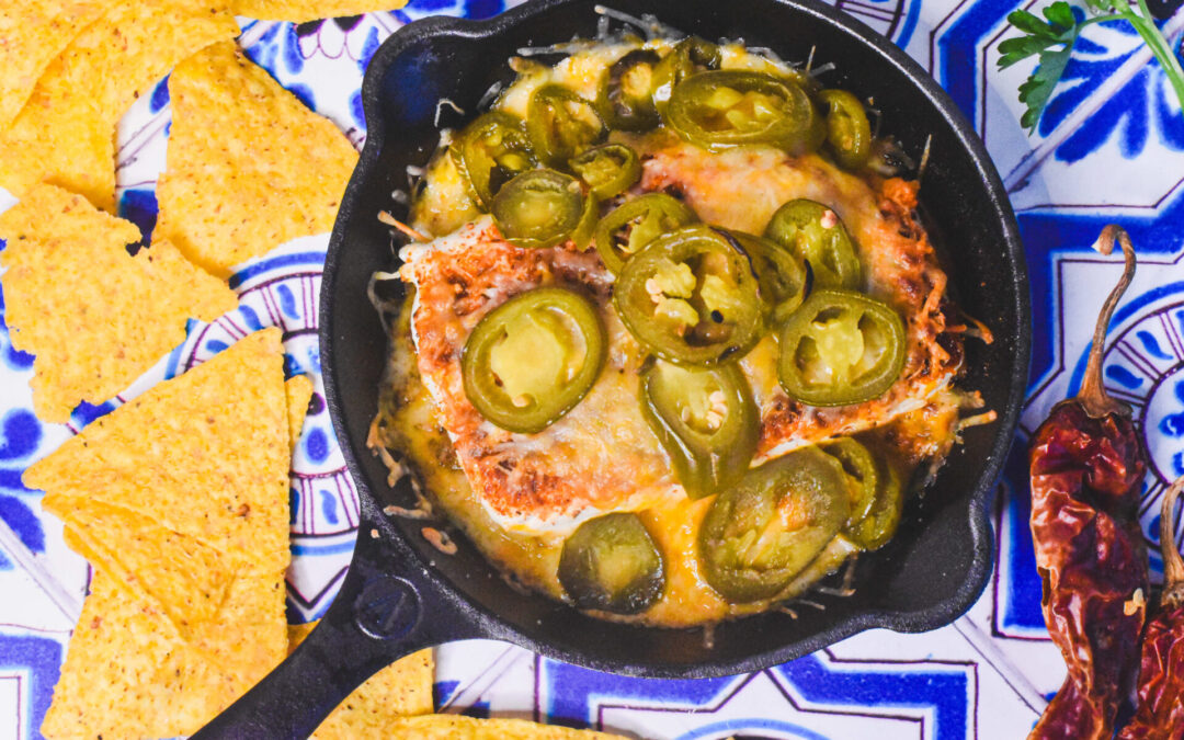 Taco dip smoked cream cheese topped with jalapeños.